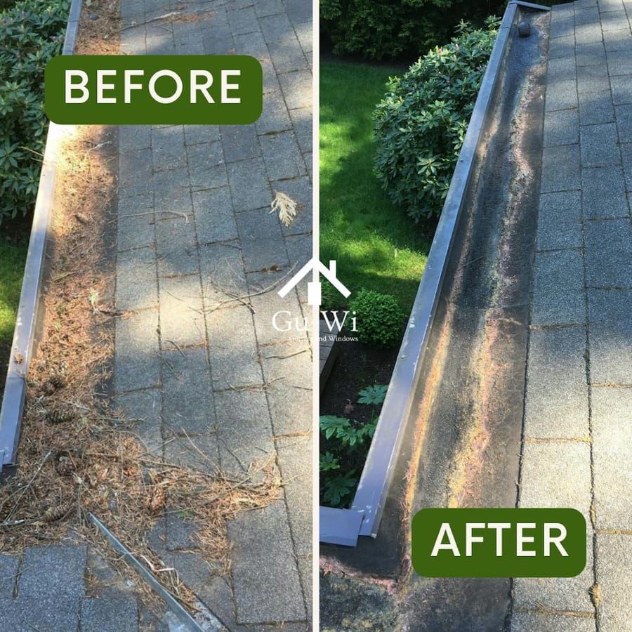 Moss and debris cleared from a gutter line